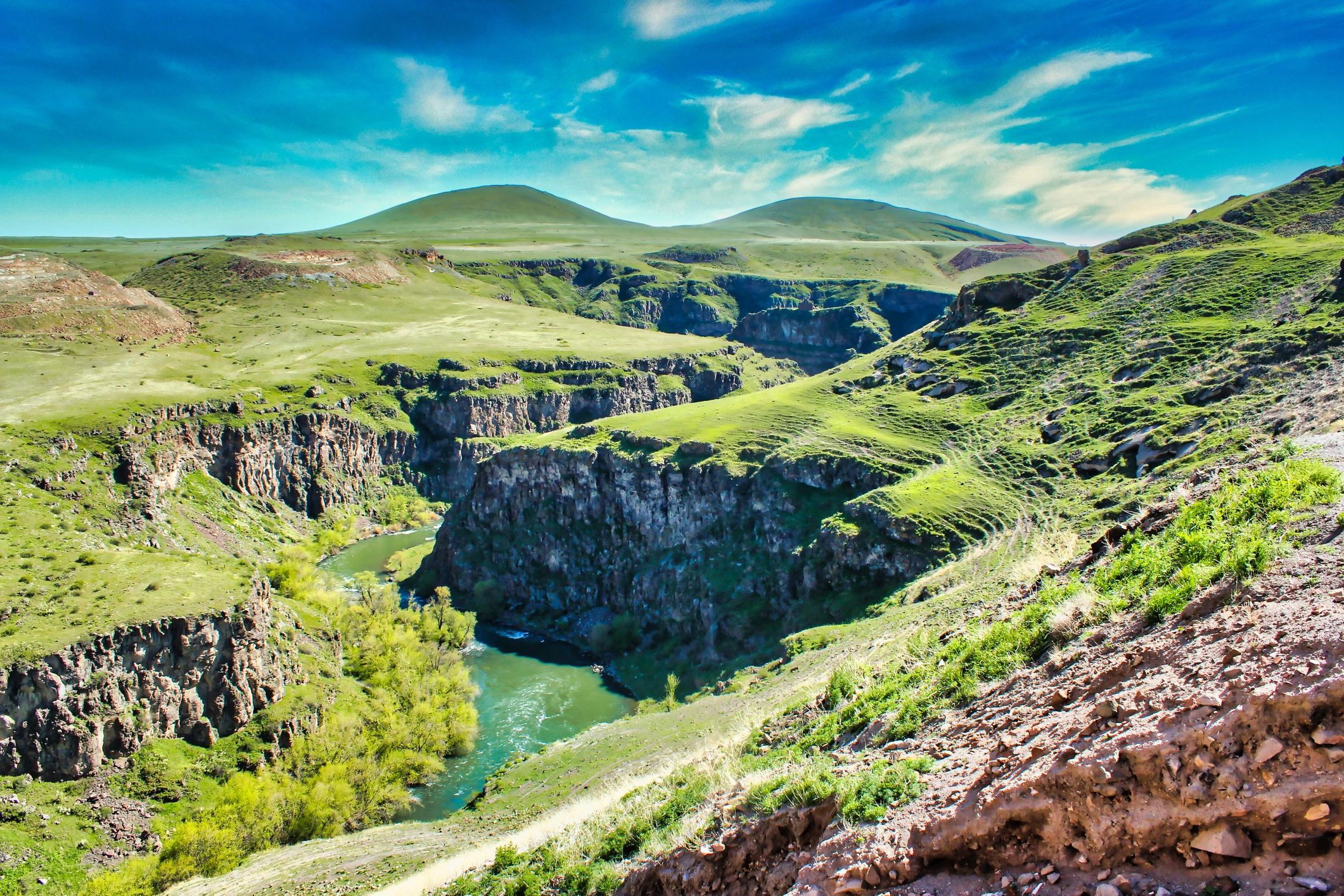 River valley landscape representing notable regions in Caldrith